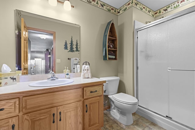 25124 Firefly Ave, Wyoming, MN 55092 - full bathroom with a shower stall, vanity, toilet, and stone finish floors