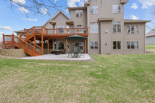 25124 Firefly Ave, Wyoming, MN 55092 - rear view of property with a wooden deck, a yard, a patio, and stairs