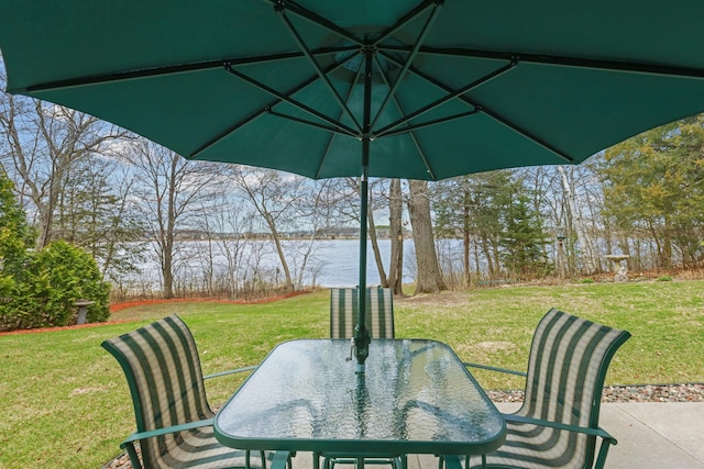 25124 Firefly Ave, Wyoming, MN 55092 - view of patio featuring a water view and outdoor dining area