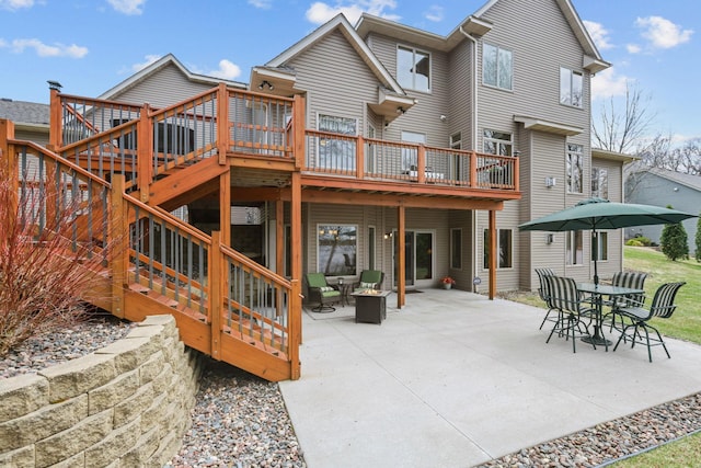 25124 Firefly Ave, Wyoming, MN 55092 - rear view of property featuring a patio and a deck
