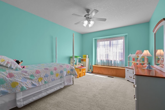 25124 Firefly Ave, Wyoming, MN 55092 - bedroom with carpet floors, a ceiling fan, and a textured ceiling