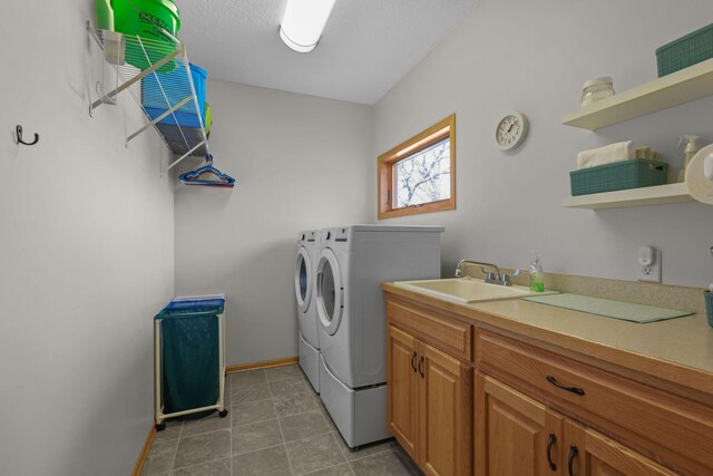 25124 Firefly Ave, Wyoming, MN 55092 - laundry room featuring independent washer and dryer, light tile patterned flooring, and cabinet space