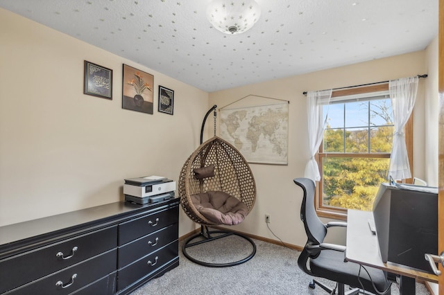 office area featuring carpet floors and baseboards