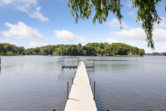 6365 Bay Ridge Rd, Mound, MN 55364 - dock area featuring a water view and a forest view