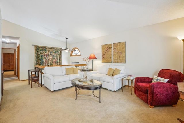 6637 Falstaff Rd, Woodbury, MN 55125 - living area with vaulted ceiling, light colored carpet, ceiling fan, and baseboards
