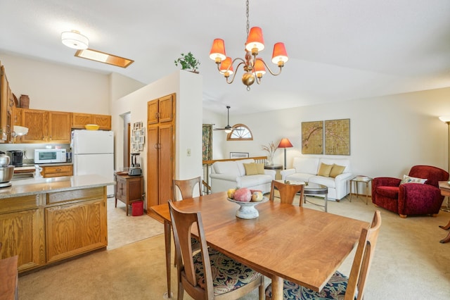 6637 Falstaff Rd, Woodbury, MN 55125 - dining space featuring lofted ceiling, light carpet, and a chandelier