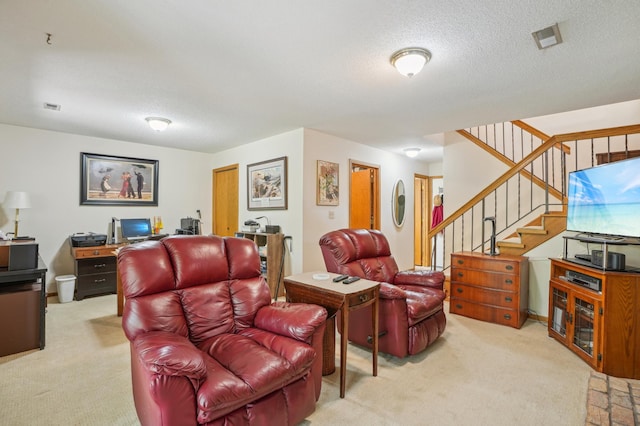 6637 Falstaff Rd, Woodbury, MN 55125 - carpeted living area featuring stairs and a textured ceiling