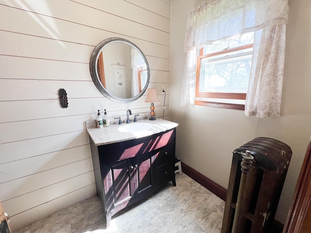 406 Pennsylvania Ave, Adrian, MN 56110 - bathroom with wood walls and vanity