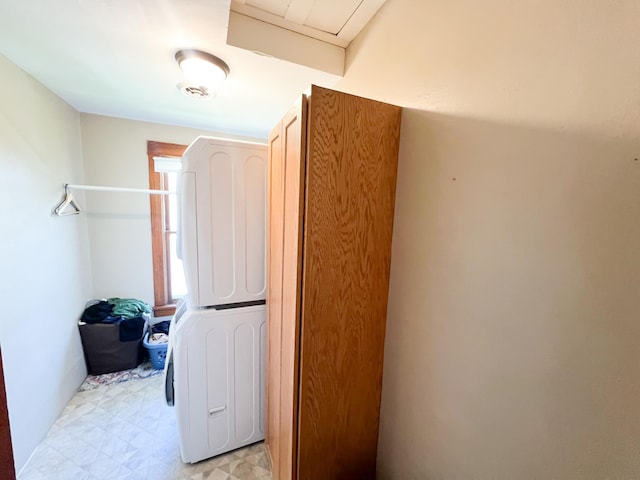 406 Pennsylvania Ave, Adrian, MN 56110 - washroom featuring stacked washer / dryer, laundry area, and light floors