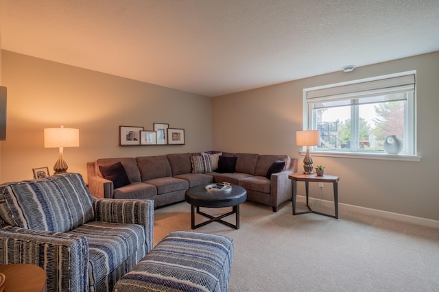living area featuring light colored carpet and baseboards