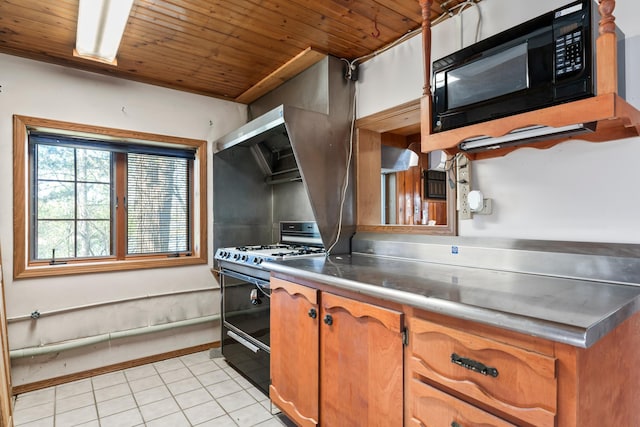 kitchen with brown cabinets, gas range oven, stainless steel counters, wooden ceiling, and black microwave