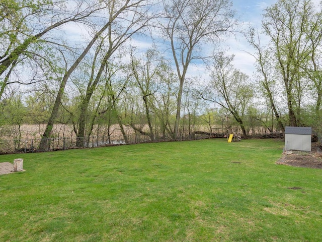 view of yard featuring fence