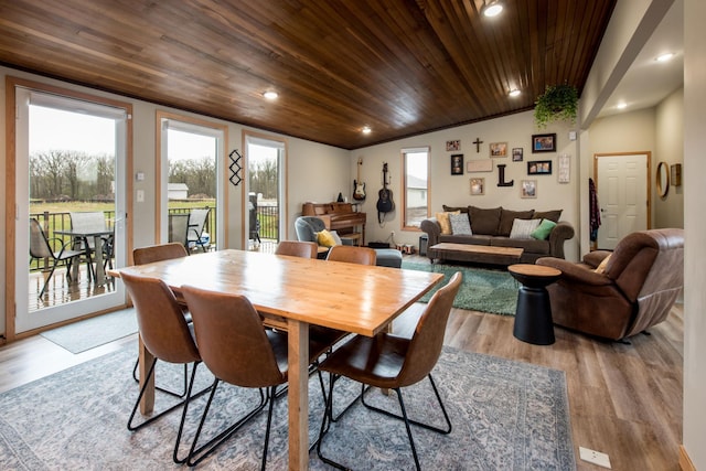 dining area featuring recessed lighting, wood ceiling, and light wood-type flooring