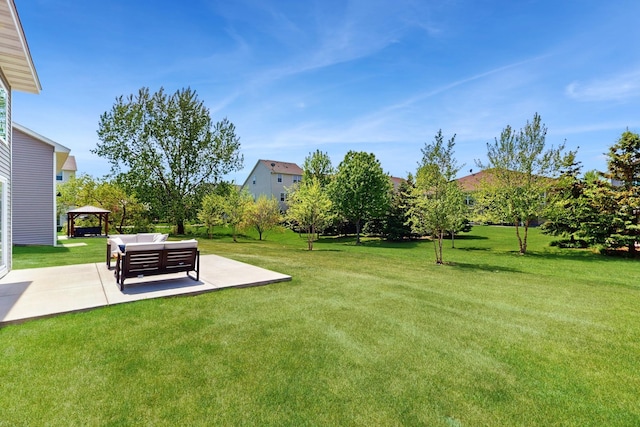 10725 Knollwood Ln, Woodbury, MN 55129 - view of grassy yard featuring a gazebo, an outdoor living space, and a patio