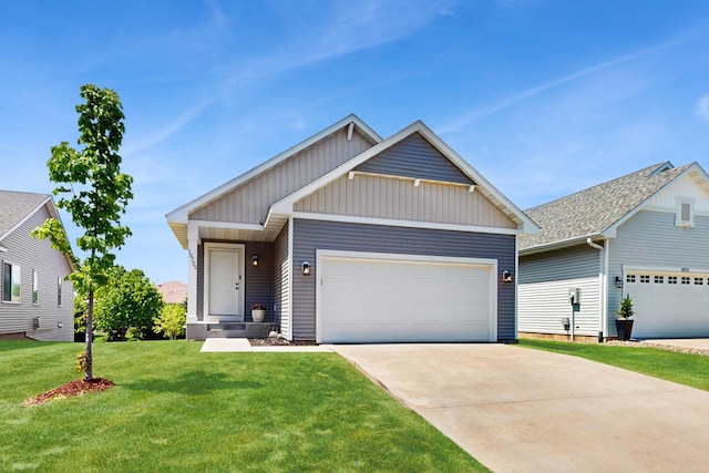 10725 Knollwood Ln, Woodbury, MN 55129 - view of front of property featuring an attached garage, driveway, and a front yard