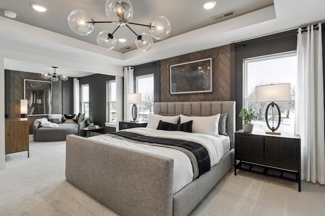 14580 106th Pl N, Maple Grove, MN 55369 - bedroom featuring visible vents, a raised ceiling, carpet, and a chandelier