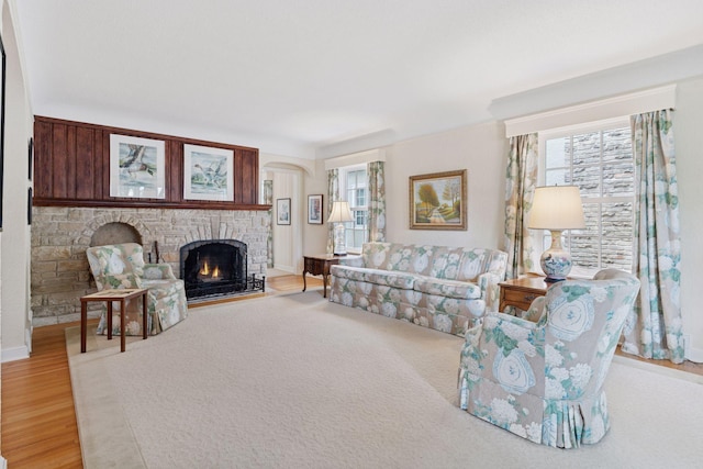 1870 Eleanor Ave, Saint Paul, MN 55116 - living area featuring light wood-style floors and a brick fireplace