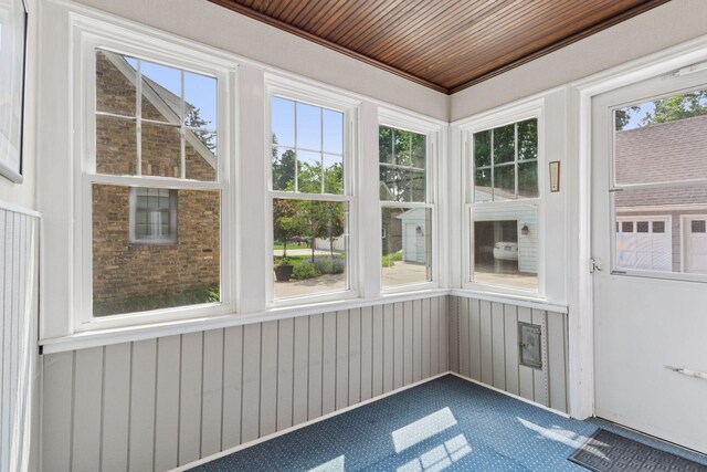 1870 Eleanor Ave, Saint Paul, MN 55116 - unfurnished sunroom featuring carpet and wood walls