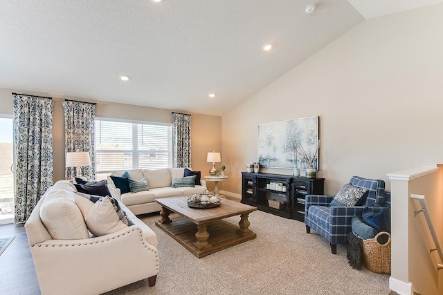 12301 71st Ct NE, Otsego, MN 55330 - living area with vaulted ceiling, recessed lighting, and baseboards