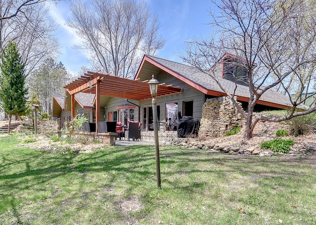 6575 145th St E, Cannon City Twp, MN 55057 - back of house with a pergola, a patio, stone siding, and a lawn