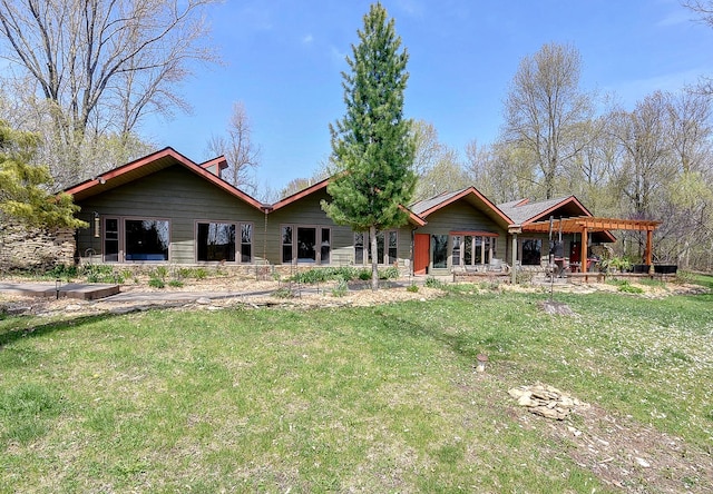 6575 145th St E, Cannon City Twp, MN 55057 - back of house featuring a yard
