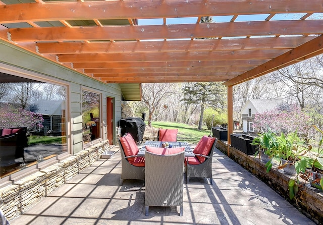 6575 145th St E, Cannon City Twp, MN 55057 - view of patio featuring outdoor dining area and a pergola