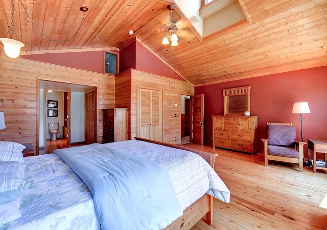6575 145th St E, Cannon City Twp, MN 55057 - bedroom with wooden ceiling, vaulted ceiling, wood walls, and hardwood / wood-style floors
