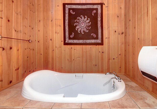 6575 145th St E, Cannon City Twp, MN 55057 - bathroom featuring a bath and wooden walls