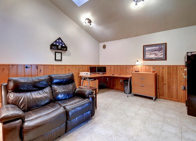 6575 145th St E, Cannon City Twp, MN 55057 - interior space with a wainscoted wall, wooden walls, and vaulted ceiling with skylight