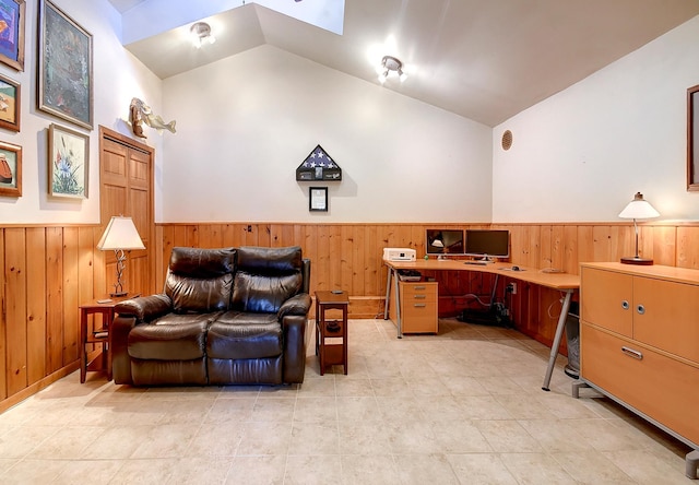 6575 145th St E, Cannon City Twp, MN 55057 - office space with light tile patterned floors, wooden walls, a wainscoted wall, and vaulted ceiling with skylight