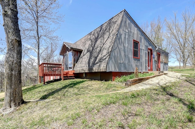 6575 145th St E, Cannon City Twp, MN 55057 - view of side of property with a yard and a wooden deck