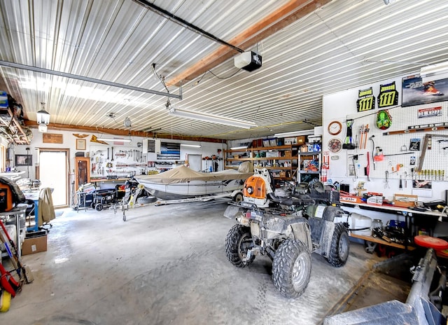 6575 145th St E, Cannon City Twp, MN 55057 - garage with a workshop area and a garage door opener