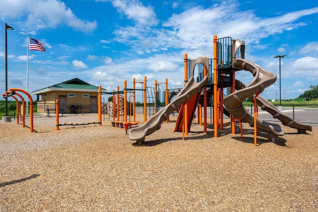 community jungle gym with fence