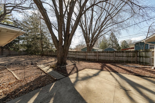 fenced backyard featuring a patio