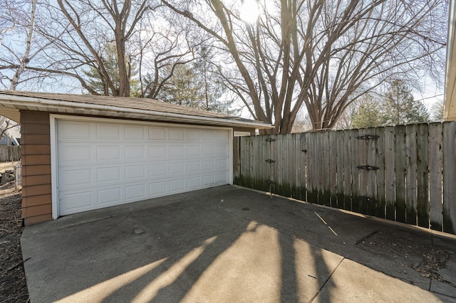 detached garage with fence