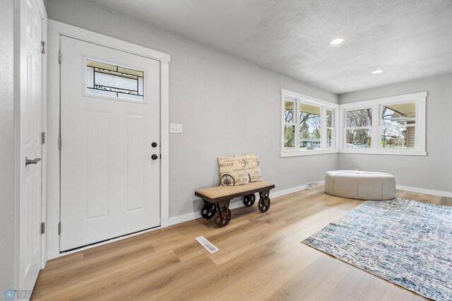 221 26th Ave N, Fargo, ND 58102 - entryway featuring wood finished floors, recessed lighting, and baseboards