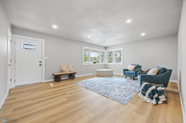 221 26th Ave N, Fargo, ND 58102 - sitting room with wood finished floors, recessed lighting, and baseboards