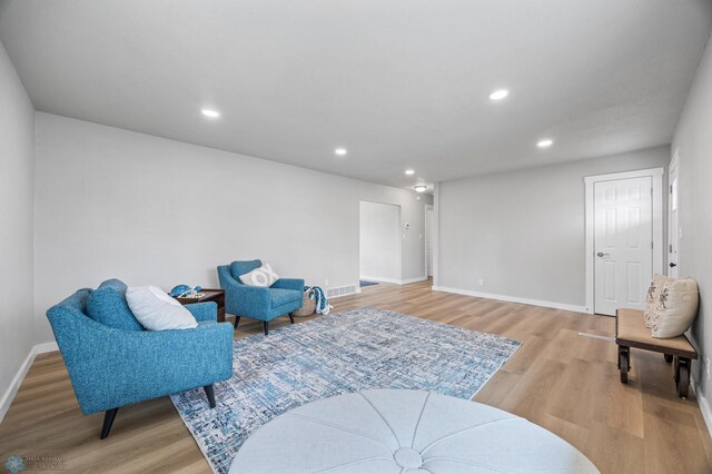 221 26th Ave N, Fargo, ND 58102 - living area featuring wood finished floors, baseboards, and recessed lighting