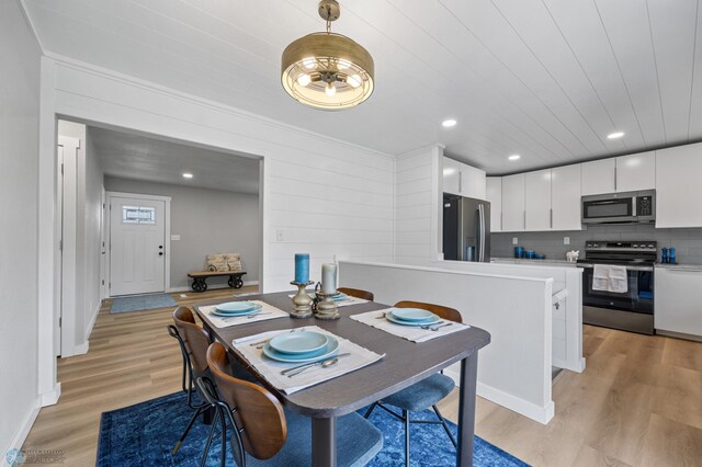 221 26th Ave N, Fargo, ND 58102 - dining space featuring light wood finished floors, baseboards, recessed lighting, and wooden ceiling