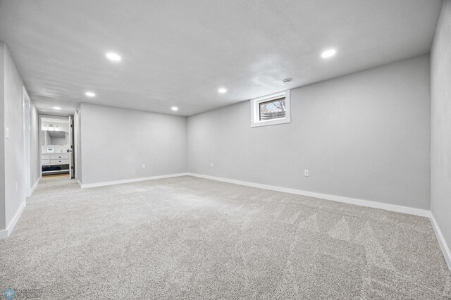 221 26th Ave N, Fargo, ND 58102 - basement with recessed lighting, carpet, and baseboards