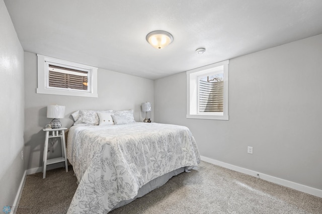 221 26th Ave N, Fargo, ND 58102 - bedroom featuring baseboards and carpet flooring