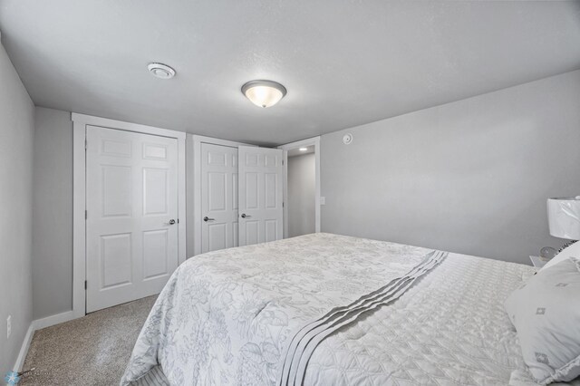 221 26th Ave N, Fargo, ND 58102 - bedroom featuring carpet and baseboards