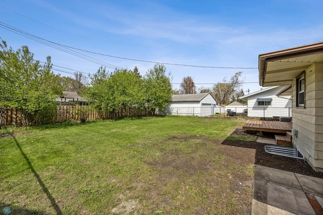 221 26th Ave N, Fargo, ND 58102 - view of yard featuring a deck