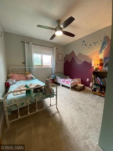 bedroom featuring a ceiling fan and carpet flooring