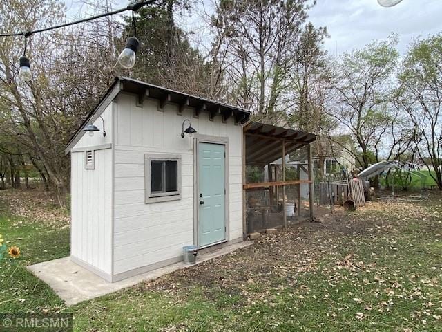 view of outbuilding with an outdoor structure