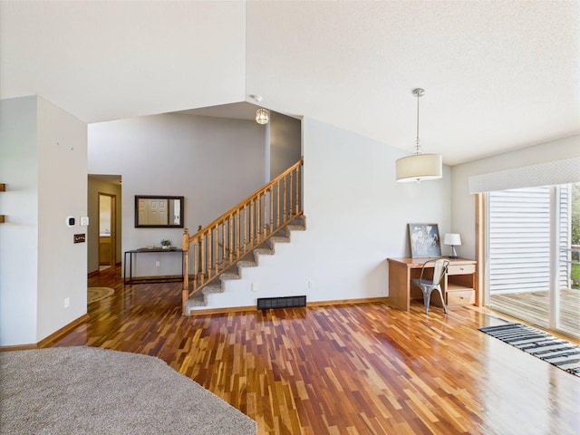2200 Orchid Dr NE, Sauk Rapids, MN 56379 - interior space featuring stairs, baseboards, visible vents, and wood finished floors