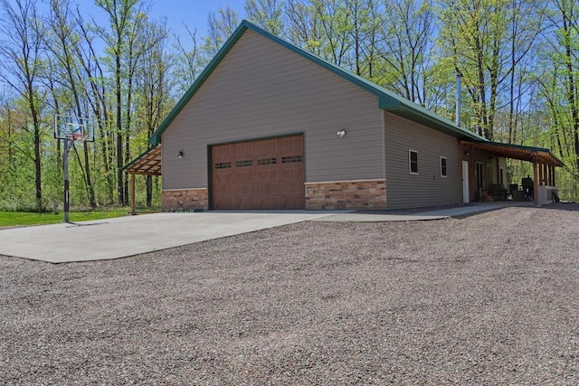 28667 Quarry St, Brook Park, MN 55007 - view of home's exterior with an attached garage, driveway, and brick siding