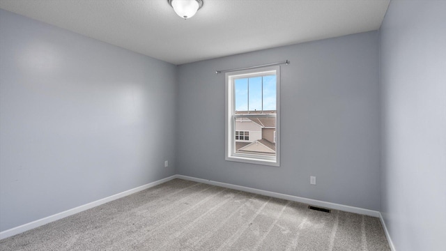 9645 Scott Ln N Unit 32, Brooklyn Park, MN 55443 - carpeted empty room with baseboards