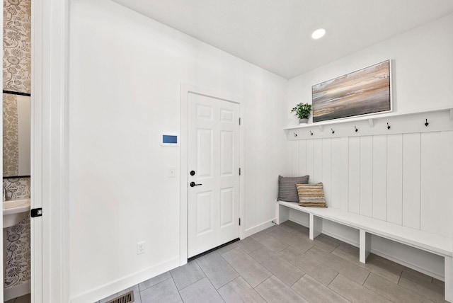 4181 Arbor Dr, Woodbury, MN 55129 - mudroom featuring baseboards, recessed lighting, and visible vents