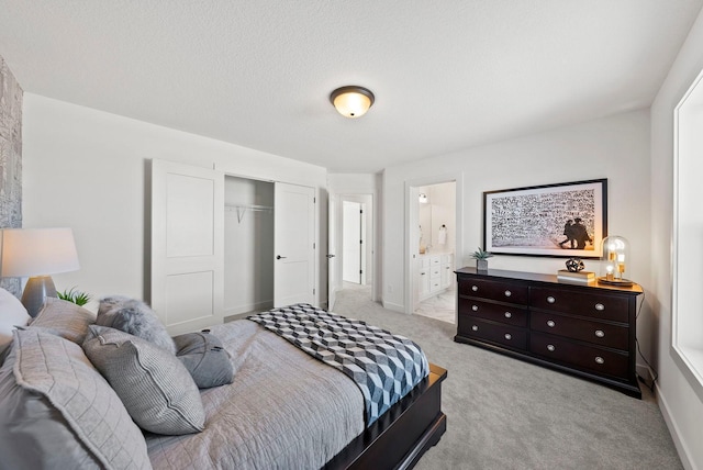 4181 Arbor Dr, Woodbury, MN 55129 - bedroom featuring connected bathroom, light carpet, and a closet
